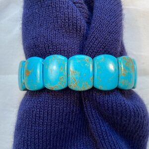 Turquoise blue bead bracelet on elastic. Or bead something of your own‎